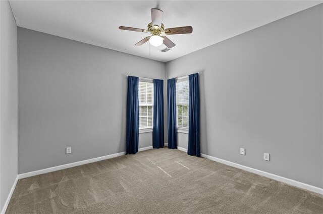 9507 Greens Mill Ct, Loganville, GA 30052 - unfurnished room with carpet floors, baseboards, and a ceiling fan