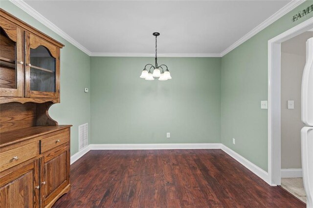 9507 Greens Mill Ct, Loganville, GA 30052 - unfurnished dining area featuring a chandelier, dark wood-style floors, baseboards, and ornamental molding
