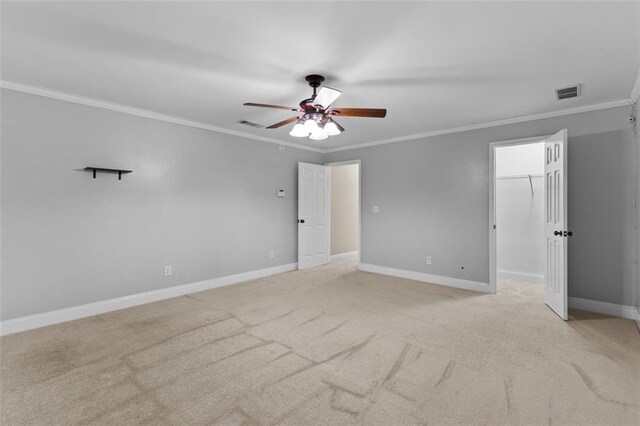 9507 Greens Mill Ct, Loganville, GA 30052 - unfurnished bedroom with ornamental molding, light carpet, baseboards, and a ceiling fan