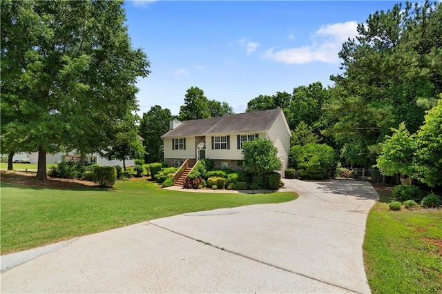 90 Cypress Dr, Covington, GA 30016 - split foyer home featuring driveway, a front yard, stairway, and stone siding