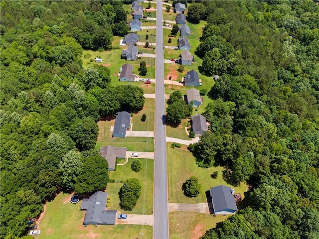 90 Cypress Dr, Covington, GA 30016 - aerial view of property and surrounding area featuring a forest