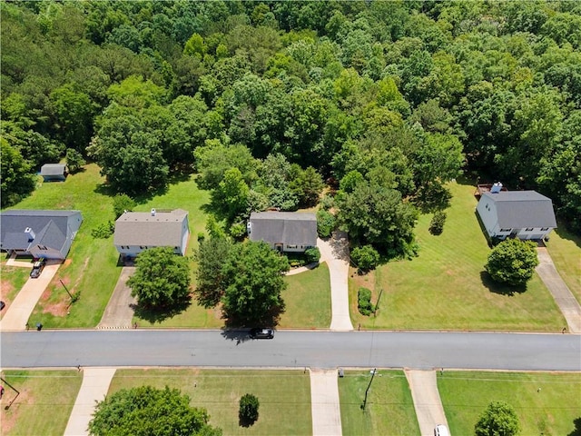 90 Cypress Dr, Covington, GA 30016 - drone / aerial view of a heavily wooded area