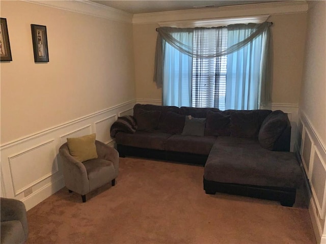 living room with carpet floors and ornamental molding