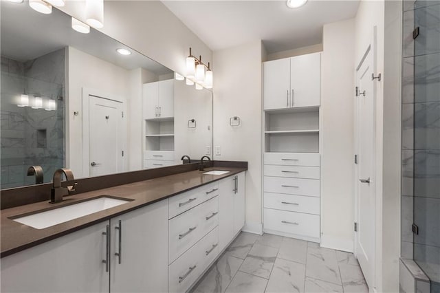 307 Cedar Dust Dr, Decatur, GA 30030 - full bathroom featuring marble look tile flooring, a shower stall, double vanity, baseboards, and recessed lighting