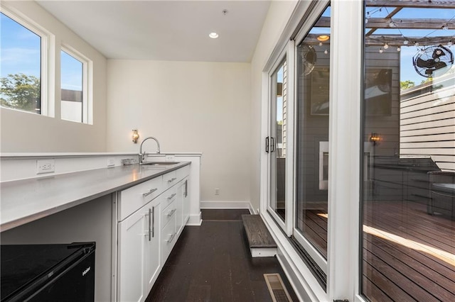 307 Cedar Dust Dr, Decatur, GA 30030 - bar with a sink, baseboards, dark wood finished floors, and recessed lighting