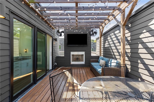 307 Cedar Dust Dr, Decatur, GA 30030 - wooden deck featuring a pergola, a fireplace, a sink, and outdoor dining area