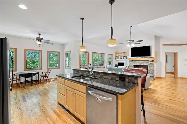 6324 Chesla Dr, Gainesville, GA 30506 - kitchen with appliances with stainless steel finishes, a sink, ceiling fan, light brown cabinets, and lofted ceiling