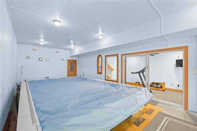 6324 Chesla Dr, Gainesville, GA 30506 - bedroom with concrete floors