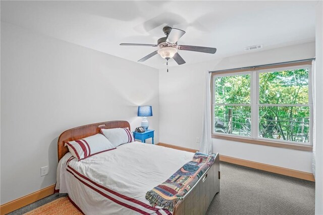 6324 Chesla Dr, Gainesville, GA 30506 - bedroom with baseboards, a ceiling fan, and carpet floors