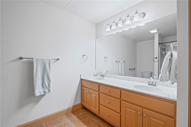 6324 Chesla Dr, Gainesville, GA 30506 - bathroom with toilet, tile patterned floors, double vanity, baseboards, and curtained shower