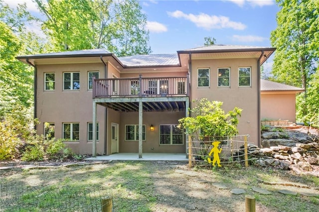 6324 Chesla Dr, Gainesville, GA 30506 - back of house with stucco siding and a patio