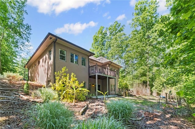 6324 Chesla Dr, Gainesville, GA 30506 - rear view of property with stucco siding and a patio