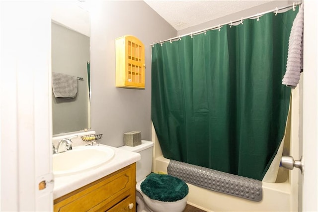 full bath with toilet, shower / bath combo, a textured ceiling, and vanity