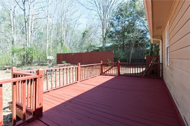 wooden deck featuring fence