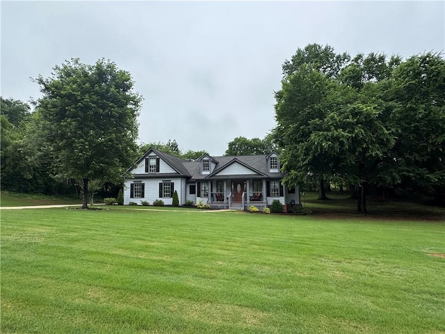 714 Arden Dr, Winder, GA 30680 - new england style home featuring covered porch and a front lawn