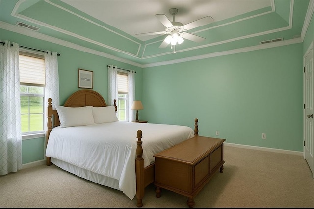 714 Arden Dr, Winder, GA 30680 - bedroom with a tray ceiling, carpet flooring, ornamental molding, baseboards, and ceiling fan