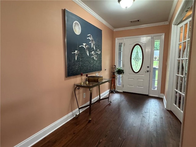 714 Arden Dr, Winder, GA 30680 - entryway featuring dark wood-style flooring, baseboards, and crown molding