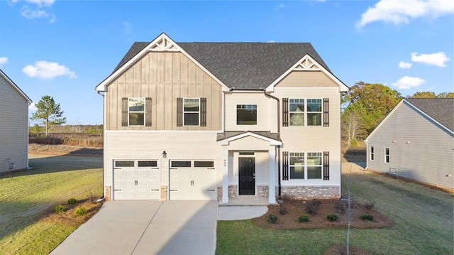 view of front facade featuring a front lawn and a garage