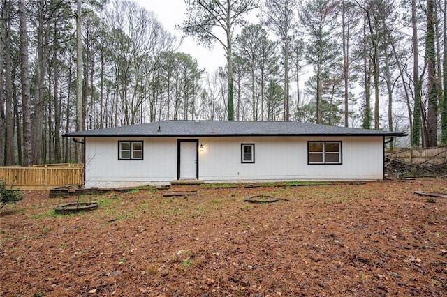 view of front of house featuring fence