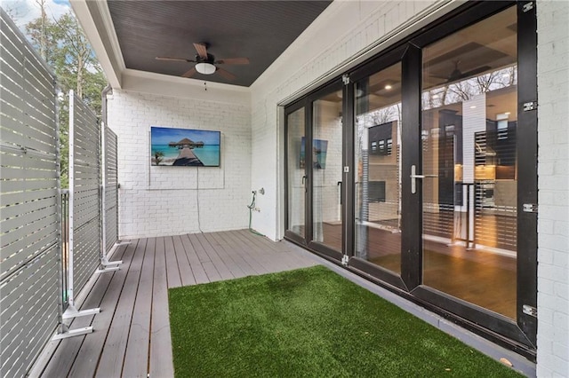 wooden terrace with ceiling fan