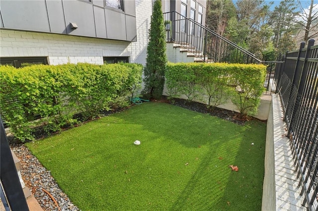 view of yard with fence