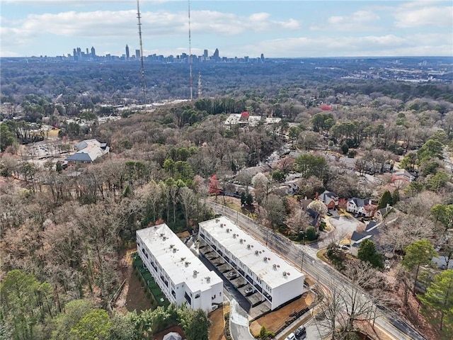 birds eye view of property with a view of city