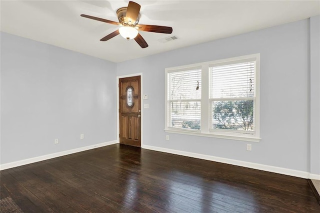 entrance foyer featuring ceiling fan and dark hardwood / wood-style floors