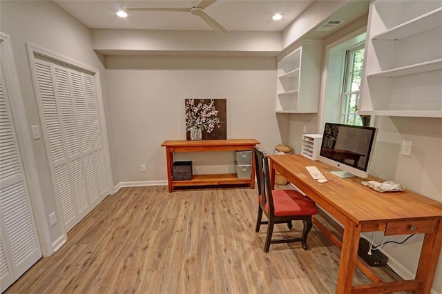 office with light wood-type flooring