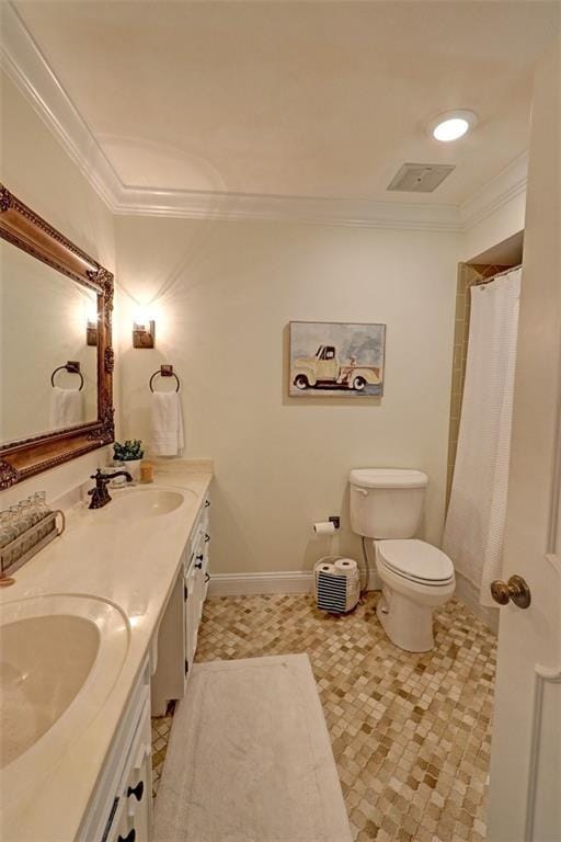 bathroom with crown molding, toilet, large vanity, and tile flooring