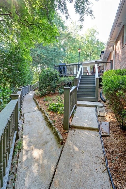 view of yard with a wooden deck