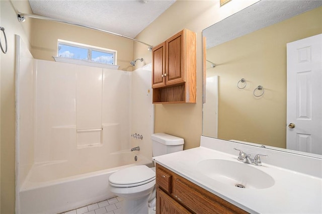 full bath featuring bathing tub / shower combination, toilet, tile patterned flooring, a textured ceiling, and vanity