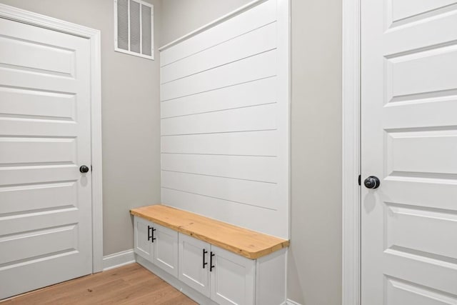 mudroom with visible vents and light wood-type flooring