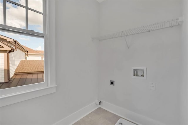 laundry area featuring a wealth of natural light, hookup for a washing machine, and hookup for an electric dryer