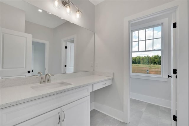 bathroom featuring vanity and tile patterned flooring