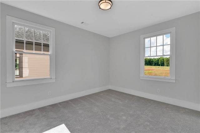 view of carpeted spare room