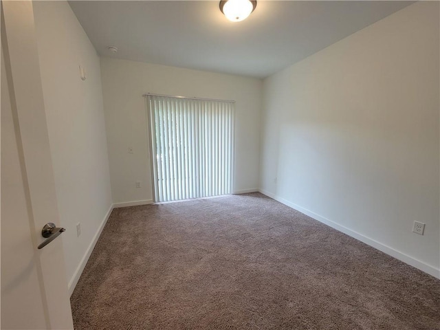 525 Parkway Dr NE Unit 306, Atlanta, GA 30308 - carpeted empty room featuring baseboards