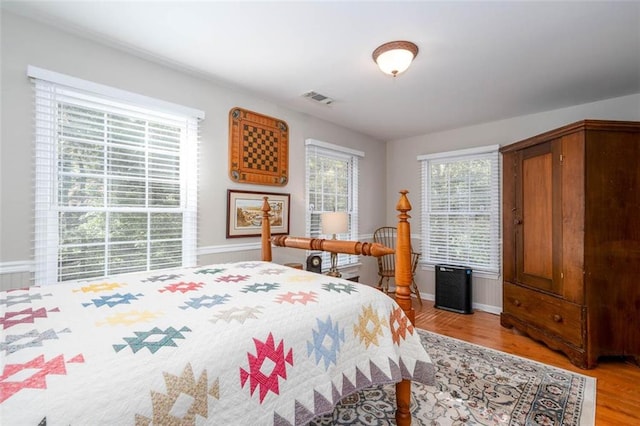 bedroom featuring light hardwood / wood-style floors