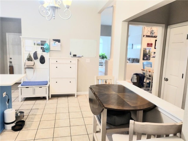 3473 Newtons Crest Cir, Snellville, GA 30078 - dining room featuring light tile patterned flooring and a chandelier