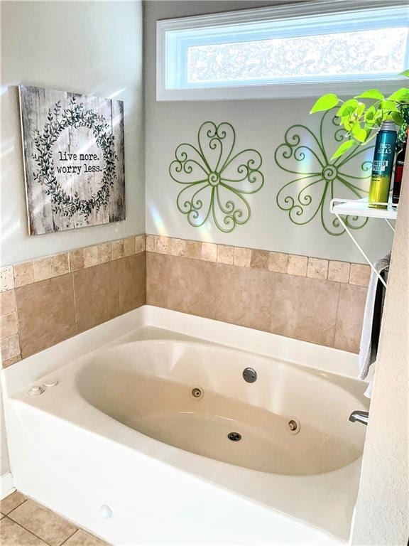3473 Newtons Crest Cir, Snellville, GA 30078 - full bath with a tub with jets and tile patterned floors