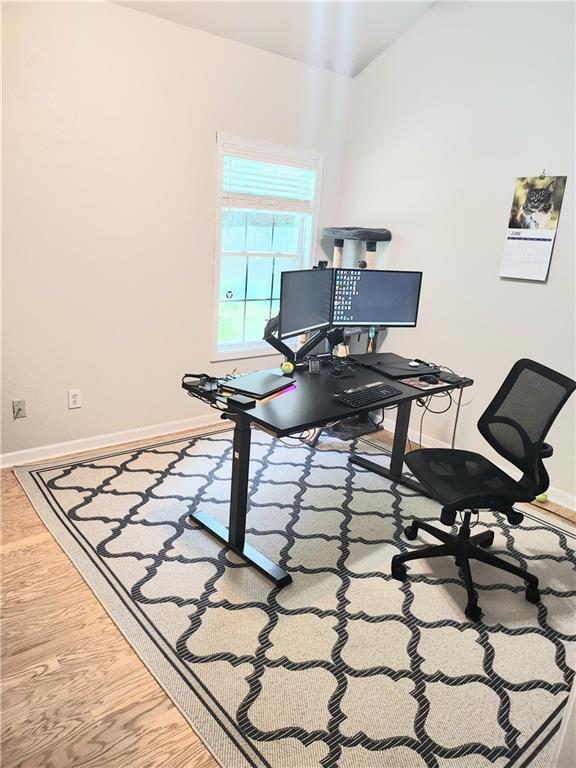 3473 Newtons Crest Cir, Snellville, GA 30078 - home office with wood finished floors and vaulted ceiling