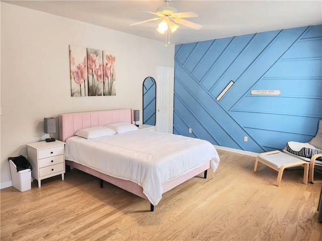 3473 Newtons Crest Cir, Snellville, GA 30078 - bedroom with light wood-style flooring and a ceiling fan