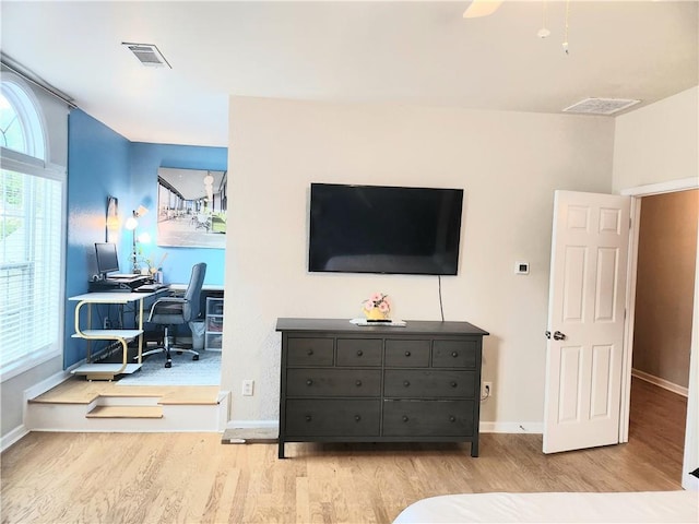 3473 Newtons Crest Cir, Snellville, GA 30078 - bedroom with wood finished floors, an office area, and ceiling fan