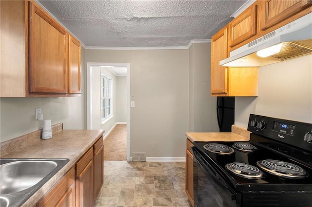 kitchen with crown molding, black electric range, and a textured ceiling