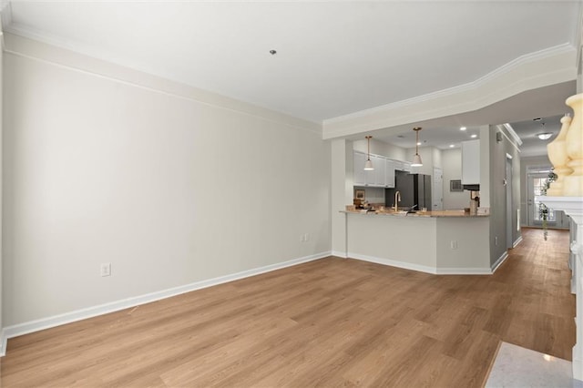 1024 Whitshire Way, Alpharetta, GA 30004 - unfurnished living room with light wood finished floors and ornamental molding