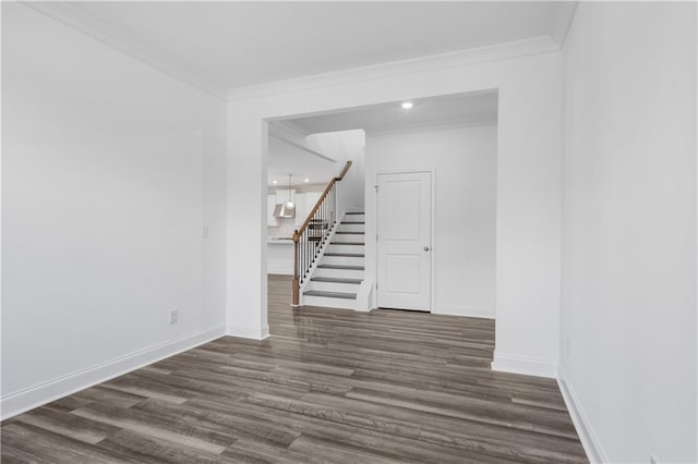 1495 Auburn Glen Rd, Dacula, GA 30019 - spare room featuring stairway, ornamental molding, baseboards, dark wood-type flooring, and recessed lighting