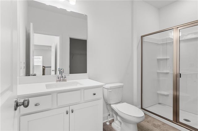 1495 Auburn Glen Rd, Dacula, GA 30019 - full bath with a shower stall, vanity, toilet, and tile patterned flooring