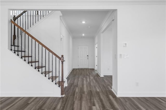 1495 Auburn Glen Rd, Dacula, GA 30019 - entrance foyer with dark wood-style flooring, baseboards, stairs, crown molding, and recessed lighting
