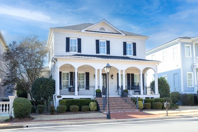 view of front of home featuring covered porch