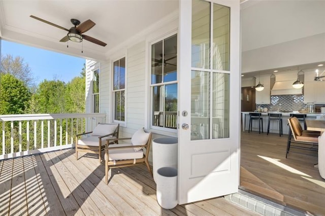 deck featuring ceiling fan