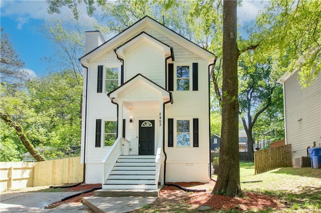 view of front of home featuring central air condition unit